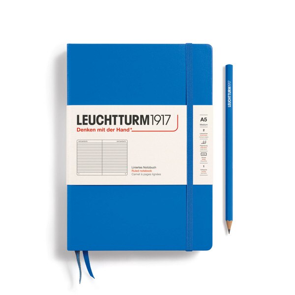 A sky blue colored hardcover notebook.